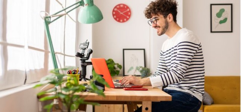 A happy man working from home
